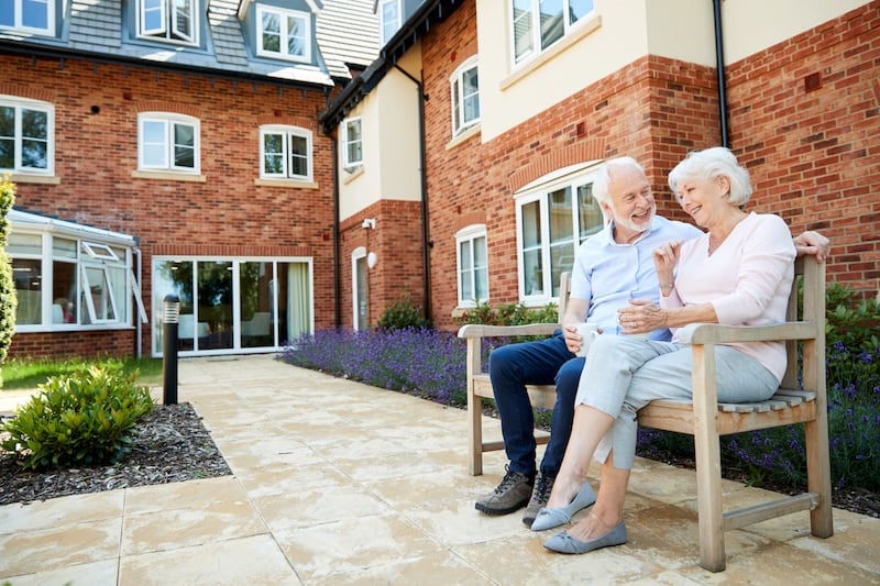 A senior couple enjoying their assisted living facility after Flexgreen has cleaned.