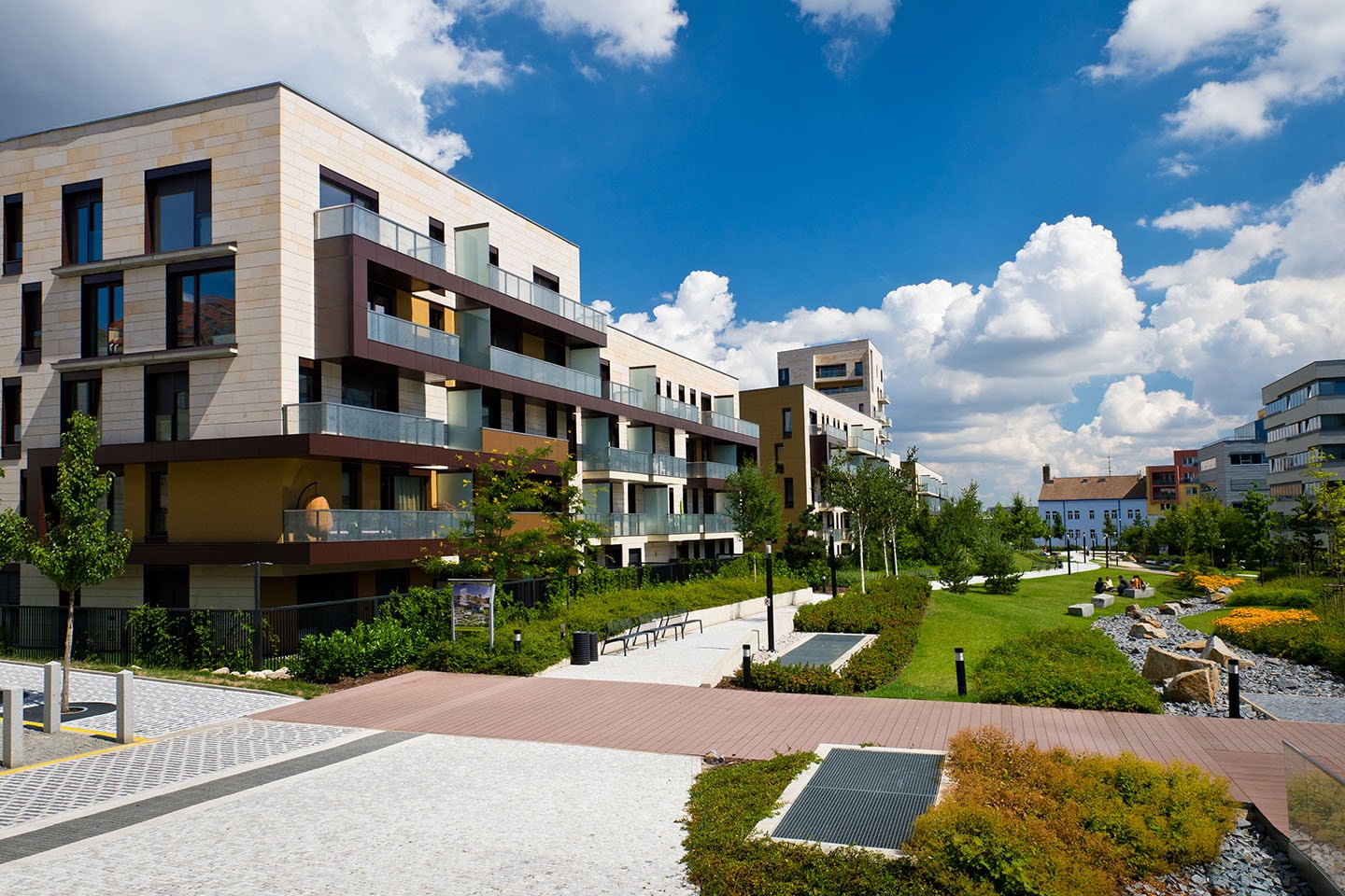 An exterior view of a mixed commercial and residential property that has a variety of flooring types